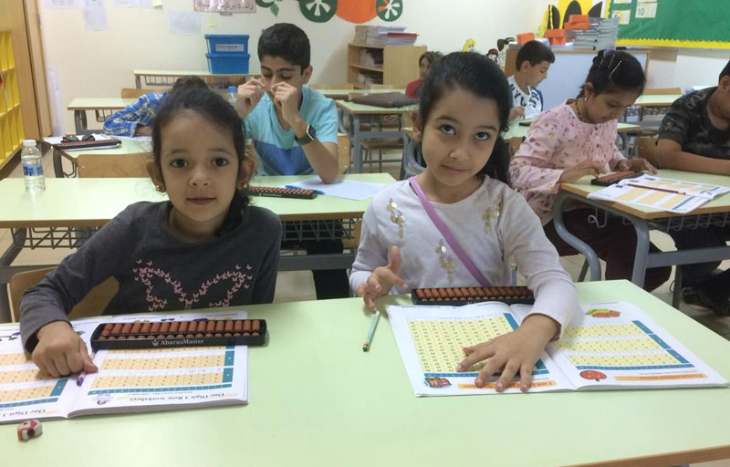 Picture of 2 little girls clearing doubts at AbacusMaster, Muscat branch